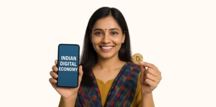 Indian woman using smartphone with digital currency icon
