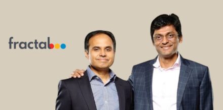 Fractal Analytics case study showing co-founders Srikanth Velamakanni and Pranay Agrawal with the corporate logo.