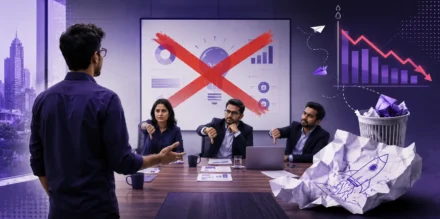 A startup founder presenting to a panel of three investors giving a thumbs down, illustrating the common reasons a pitch deck is rejected by Indian investors.